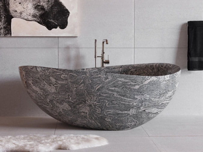 Free standing stone bathtum